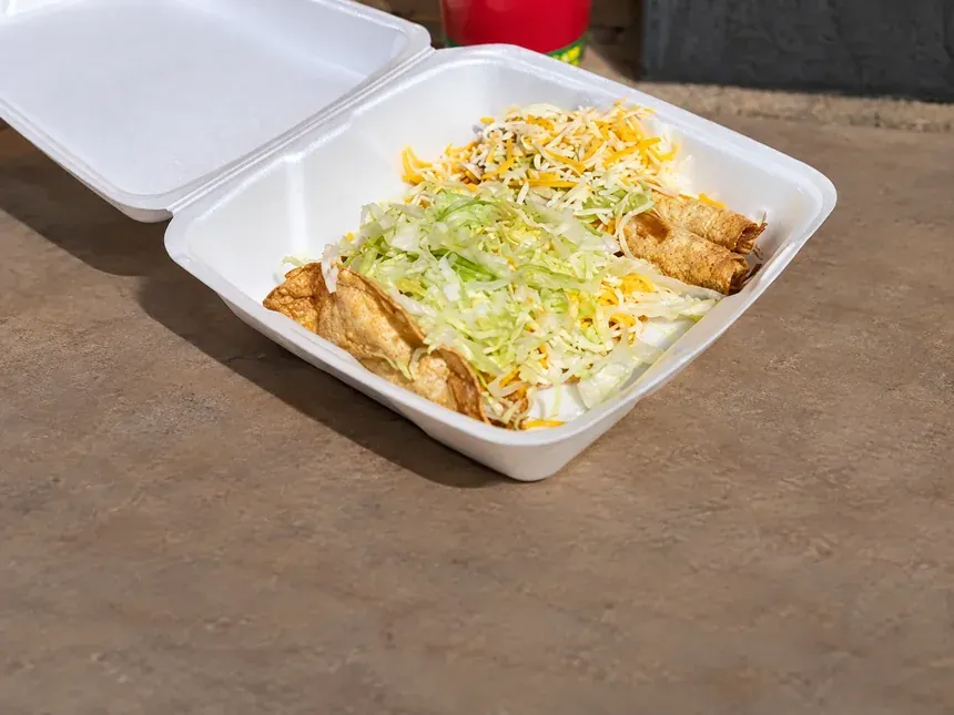 Rolled tacos with cheese at Taco Star Alameda in Denver